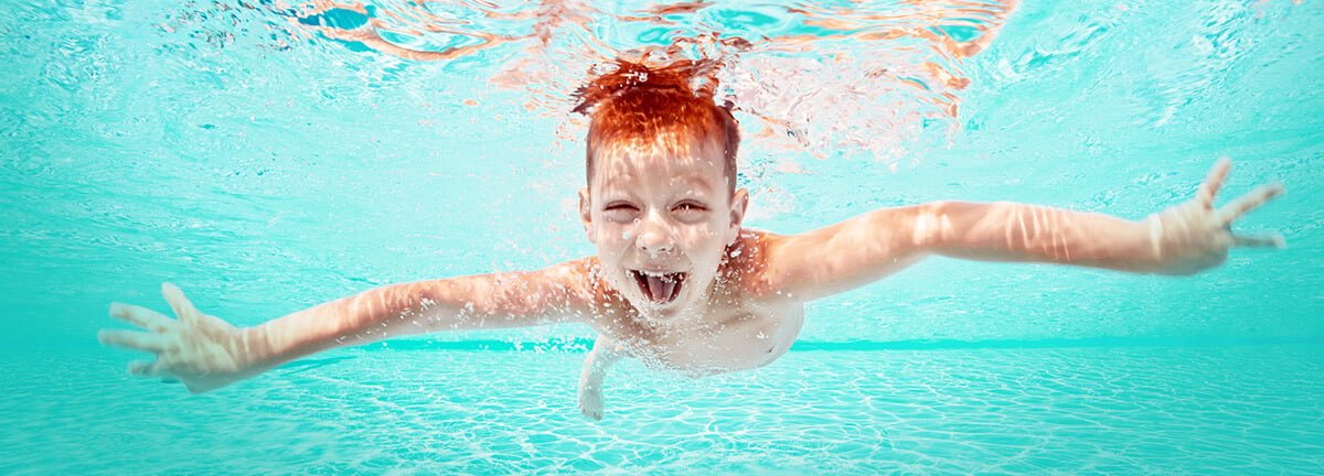 SwimEye - a drowning detection system for swimming pools